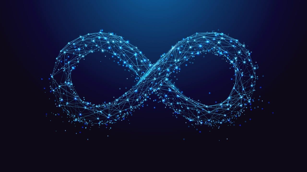 Photo d'un symbole infini lumineux formé de points connectés illustrant le cycle DevOps